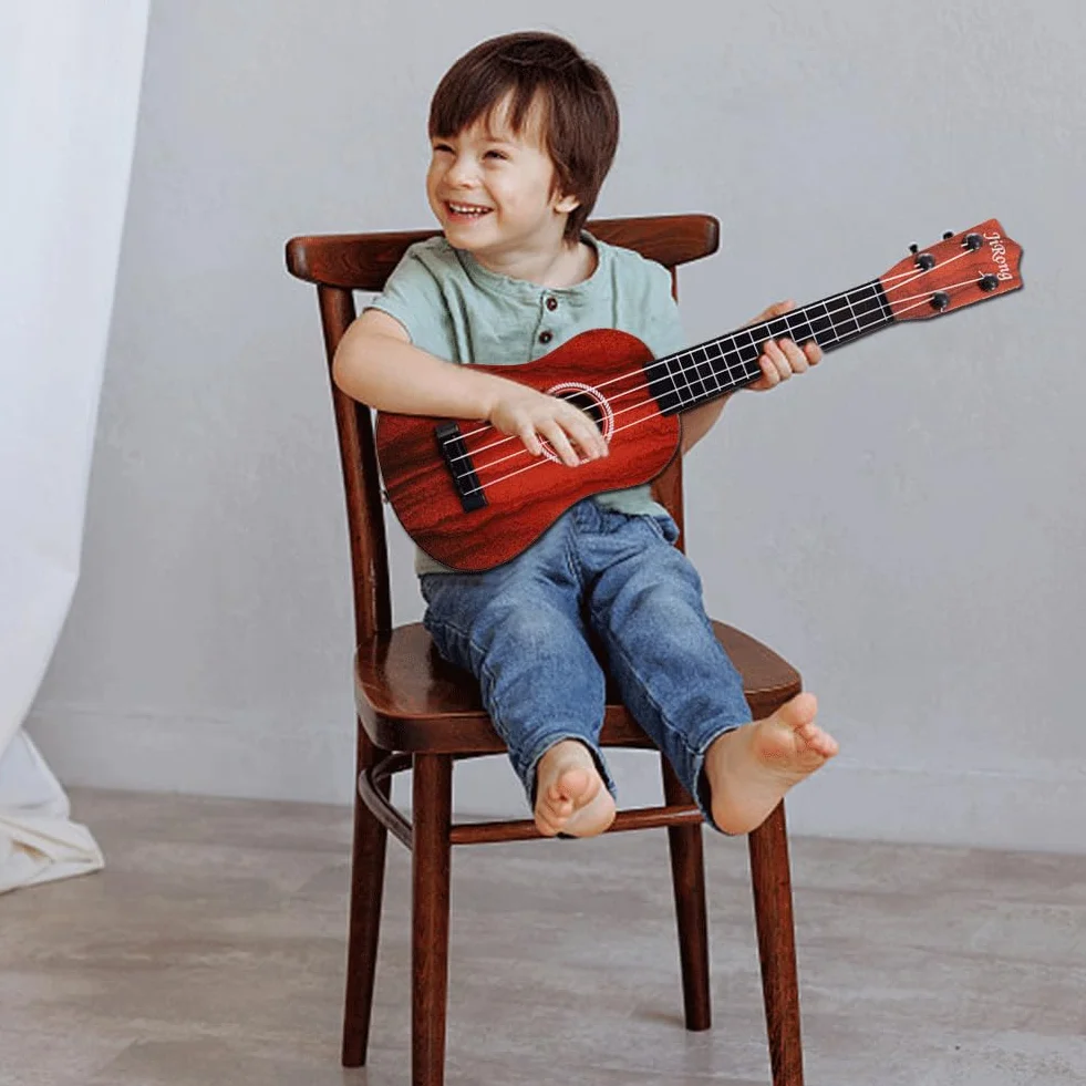 PLUSHCEWT Instrumenty dla dzieci Gitara Ukulele, 42 cm Gitara Akustyczna Zabawka z 4 regulowanymi strunami, Gitara Muzyczna Ukulele dla dzieci Edukacja Kreskówka Mini Gitara (czerwony)